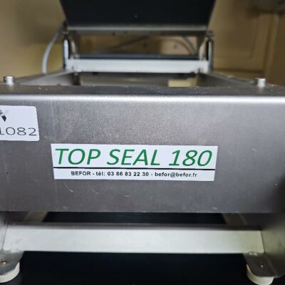 Machine à sceller les barquettes alimentaires de marque Top Seal modèle 180.